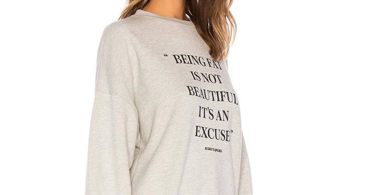 En tröja med texten "Being fat is not beautiful, it's an excuse"