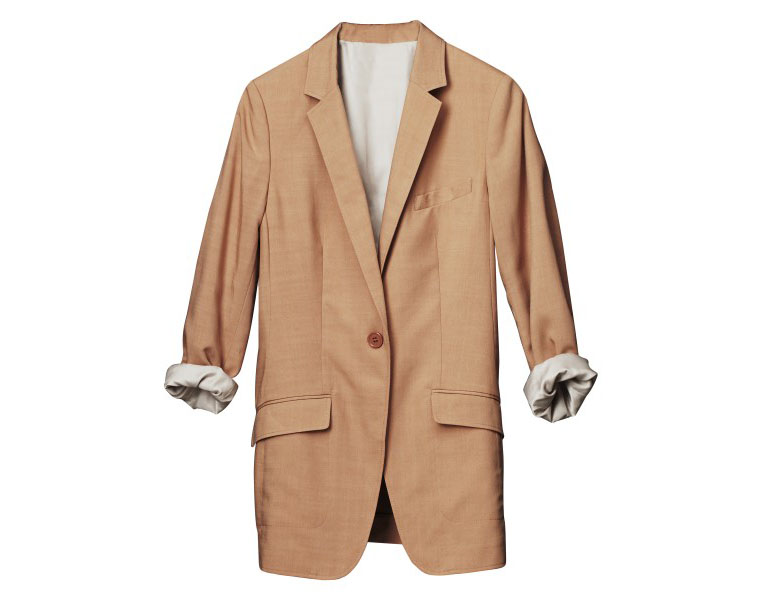 Beige kavaj med upprullade ärmar. Beige kavaj med upprullade ärmar.